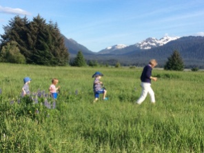 Liam, cousin Eliza, Finlay and Grandma hunt for a sandy beach on the Mendenhall Wetlands.